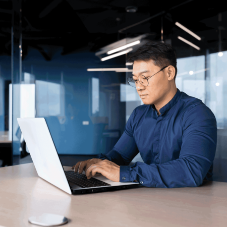 Education HR employee on his laptop