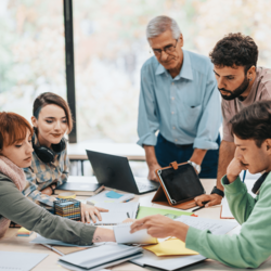 Team of academic administrators working at a conference table