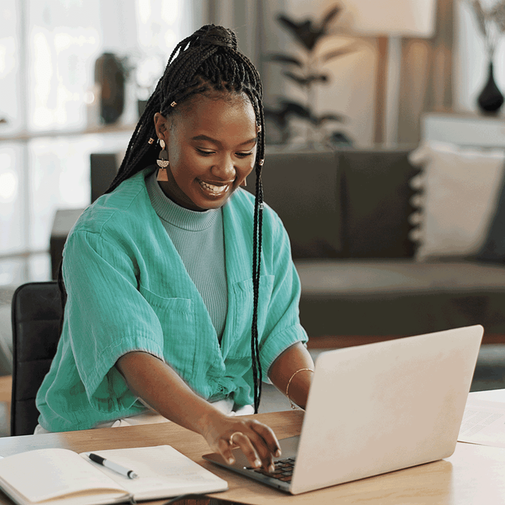 Happy woman on a laptop