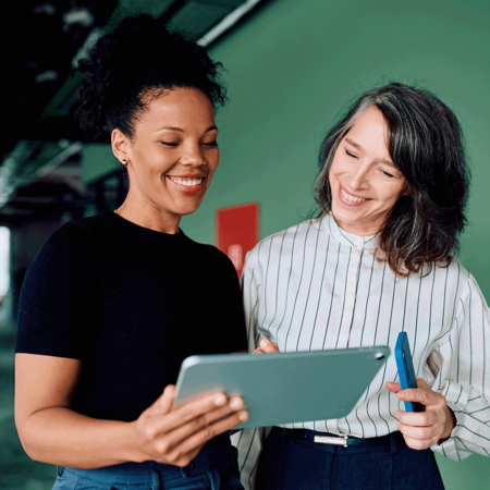Women collaborating on a tablet