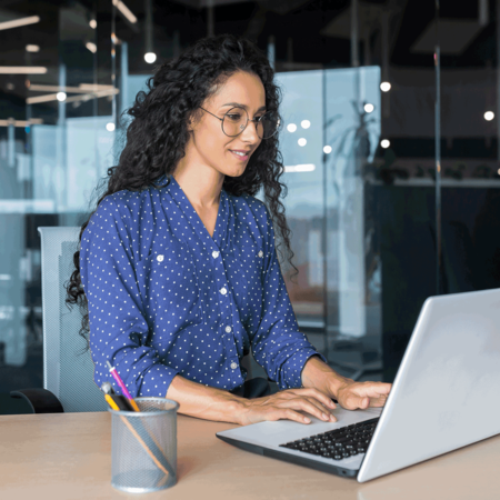 Woman at a laptop in an office