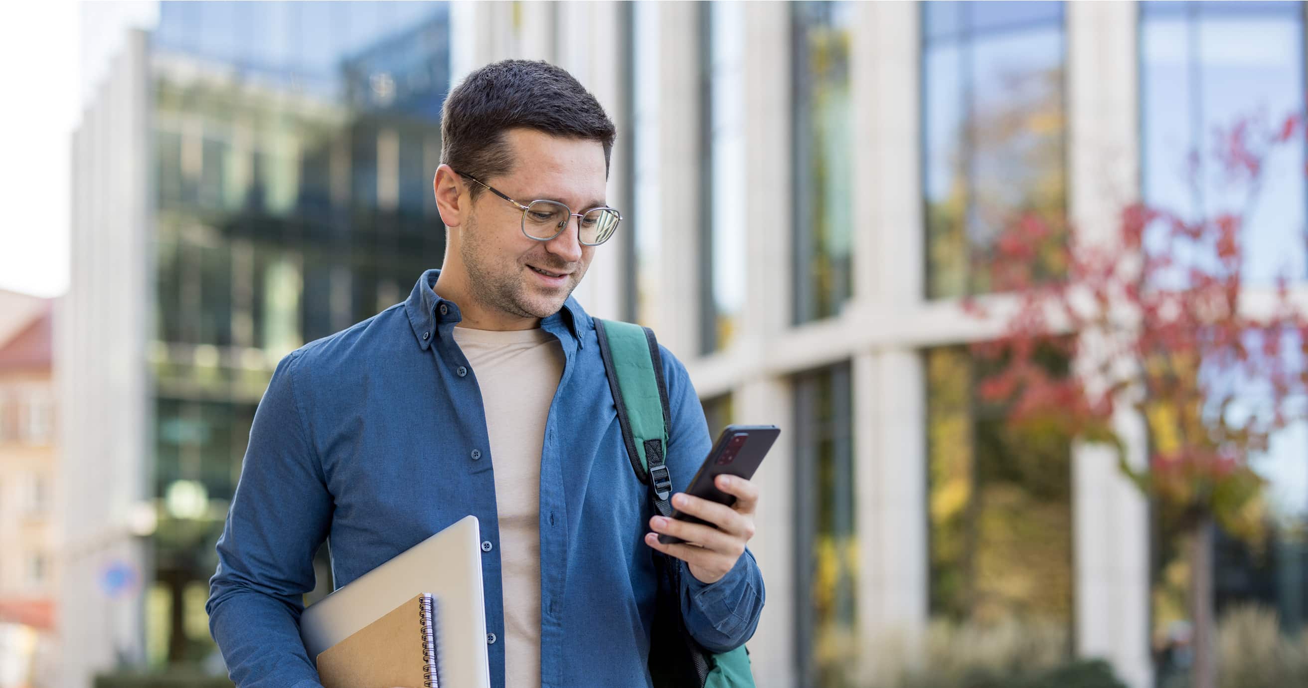 Man outside on mobile phone