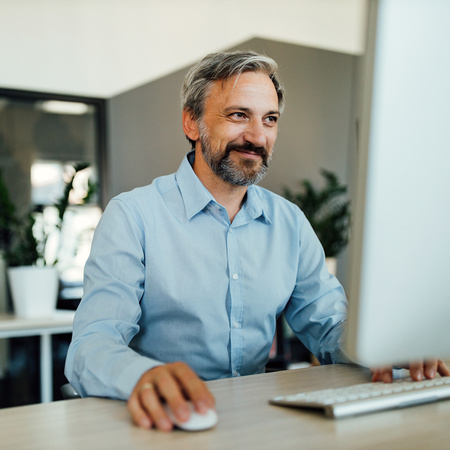 Education professional using computer