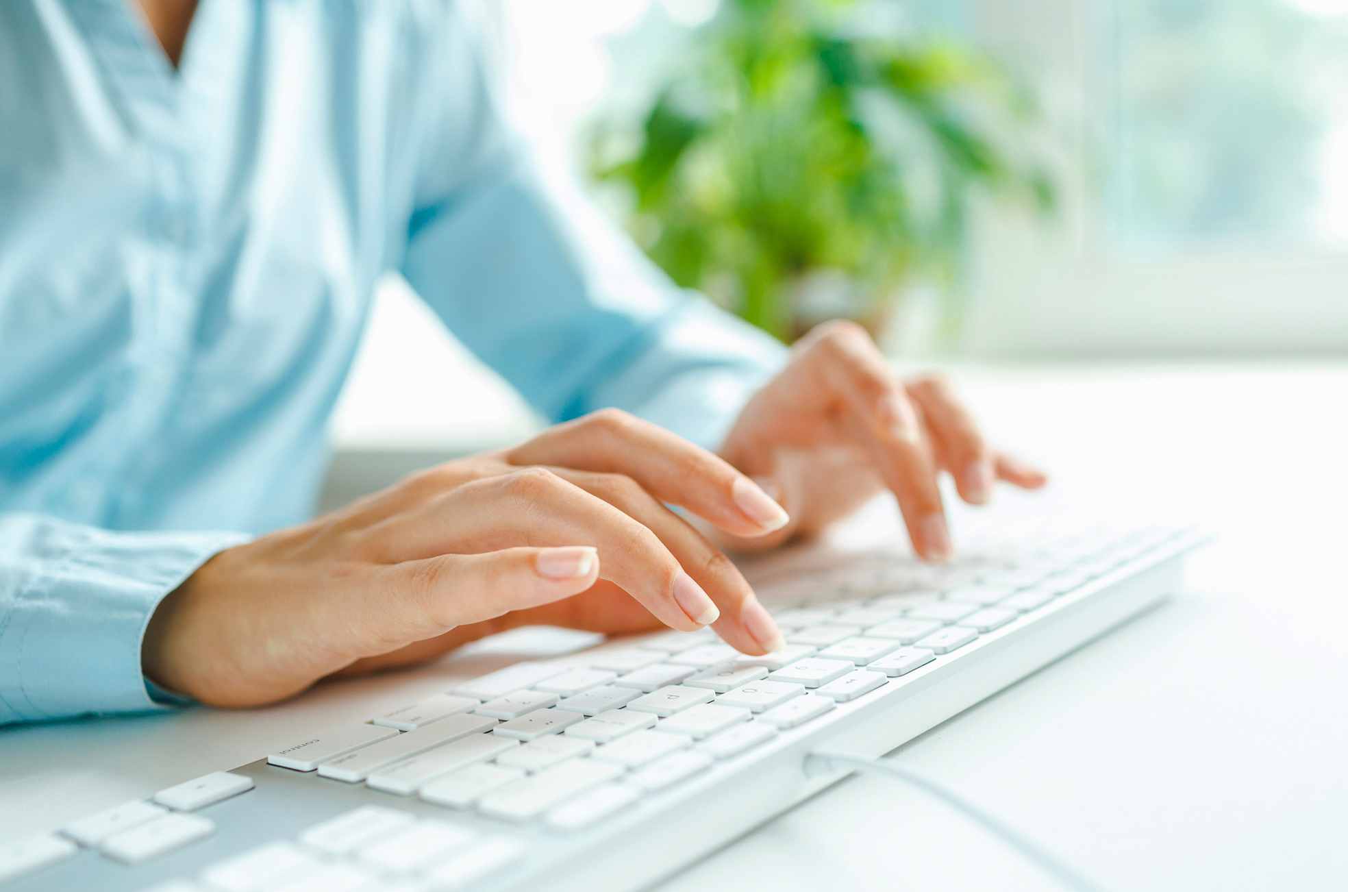Person in office typing