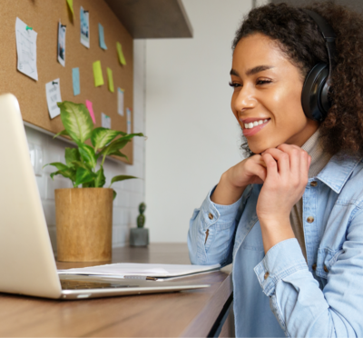 Woman attending a webinar on her laptop