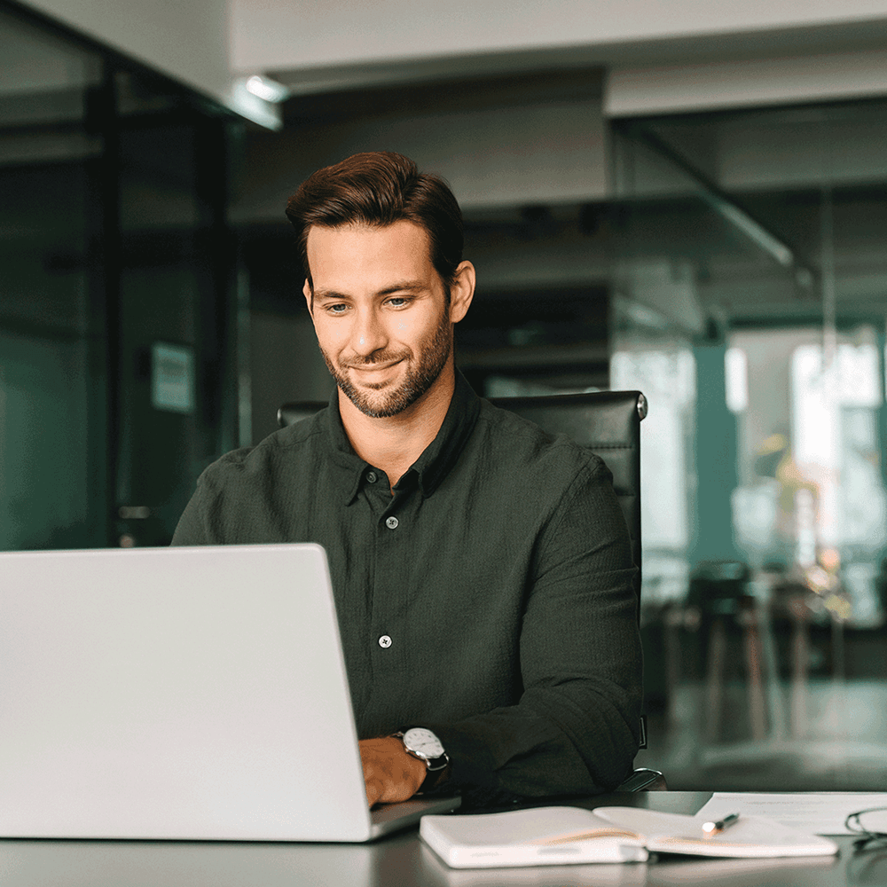 Man on a laptop reviewing security